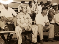 31 July 1947, Ft. Shafter, Oahu, T.H. Two disabled veterans of the famed 100th Infantry Battalion, as special guests of Lt. General John E. Hull, Commanding General, AGFPAC, watch the reactivation ceremonies of the 442nd Infantry Regiment and the 100th Infantry Battalion into the regular Army Reserve Corps at Ft. Shafter. L to R: Cpl Tsugio Katsuka and S. Inouye. (Note: Shigeru Inouye)