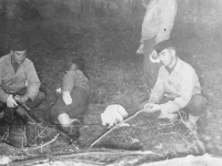 Officers of company roasting hot dogs. [Courtesy of Bert Hamakado]