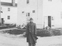 Tadayoshi Hamasaki stands in front of the barracks at Camp McCoy, Wisconsin, 1942. [Courtesy of Mary Hamasaki]