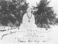 Mele Kalikimaka snowman at Camp McCoy, Wisconsin, 1942. [Courtesy of Mary Hamasaki]