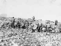 Soldiers rest on a Cassino hillside. [Courtesy of Mary Hamasaki]