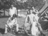 LEFT:  Seiso Kamishita cutting Kenneth Higa's hair, RIGHT:  Migi Hasegawa cutting Robert Kapuniai's hair [Courtesy of Kenneth Higa]