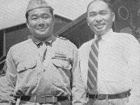 Well known University of Hawaii Agricultural Dept. head, Baron Goto greets his younger brother, s/sgt. Masaichi Goto. Da War All Pau!!!   [U.S. Army Signal Corps]