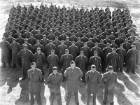 (December 11, 1942) 100th Infantry Battalion, Company "A", in Camp McCoy, Wisconsin.  Eugene Kawakami is in the second row, third from the right. [Courtesy of Joanne Kai]