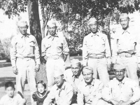 Taken at Wisconsin Rapids. Standling Left to Right. Sgt. Yamada (married), M. Okazaki, Akimoto, Corp. Tomai; Sitting Left to Right: Sgt. Yamada's Nephew & Niece. Yours Truly, Joe Takata (Married) Hide Yamashita (married) Yozo Yamanioto (married). [Courtesy of Leslie Taniyama]