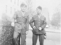 Joe and Mike in front of our house. The place we boarded. [Courtesy of Leslie Taniyama]