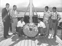 Kenneth Otagaki with fellow 100th Battalion veterans pay respects to their fallen friends. [Courtesy of Robin Otagaki]