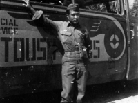 Robert Arakaki in front of an Italian tour bus [Courtesy of Robert Arakaki]