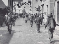 Soldiers Marching through Italian Town. [Courtesy of Fumie Hamamura]