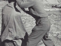 Hiyane in Italy, cutting hair in the field. [Courtesy of Fumie Hamamura]