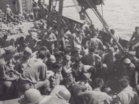 Soldiers gamble onboard on the way to France, 1944. [Courtesy of Fumie Hamamura]