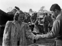 Coffee and Donuts are distributed during a USO show in France, 1944 [Courtesy of Fumie Hamamura]