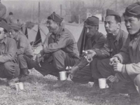 Radio section enjoying coffee and donuts from the USO. [Courtesy of Fumie Hamamura]