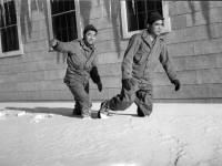 Soldiers walk through the first snowfall, Camp McCoy, November 1942 [Courtesy of Fumie Hamamura]