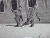 Soldiers walk through the first snowfall, Camp McCoy, November 1942. [Courtesy of Fumie Hamamura]