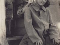 Stanley Hamamura gives a soldier a haircut. [Courtesy of Fumie Hamamura]