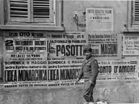 Jimmy Inafuku walks one of the 100th Battalion's dogs through Italian streets [Courtesy of Carol Inafuku]