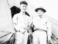 James & Kajoika in front of a tent at Schofield Barracks, Hawaii [Courtesy of Alexandra Nakamura]