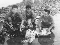 Soldiers with sheepshead at Cat Island, Mississippi. [Courtesy of Mrs. William Takaezu]