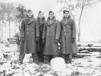 Camp McCoy Sept 26,, 1942.  Just before leaving for Madison. A. Sahara, Me, T. Ibaraki, T. Okumura. Notice snowball in front. [Courtesy of Leslie Taniyama]