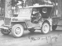 An MIS soldier and his jeep in the Philippines. [Courtesy of Florence Matsumura]