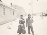 Toshiro Morishige (left) with a friend during the first snow storm of the year at Camp McCoy, Wisconsin. [Courtesy of Morishige Family]