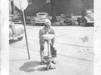 Yozo Yamamoto drinking at a water fountain while on furlough in Madison, Wisconsin [Courtesy of Sandy Erlandson]